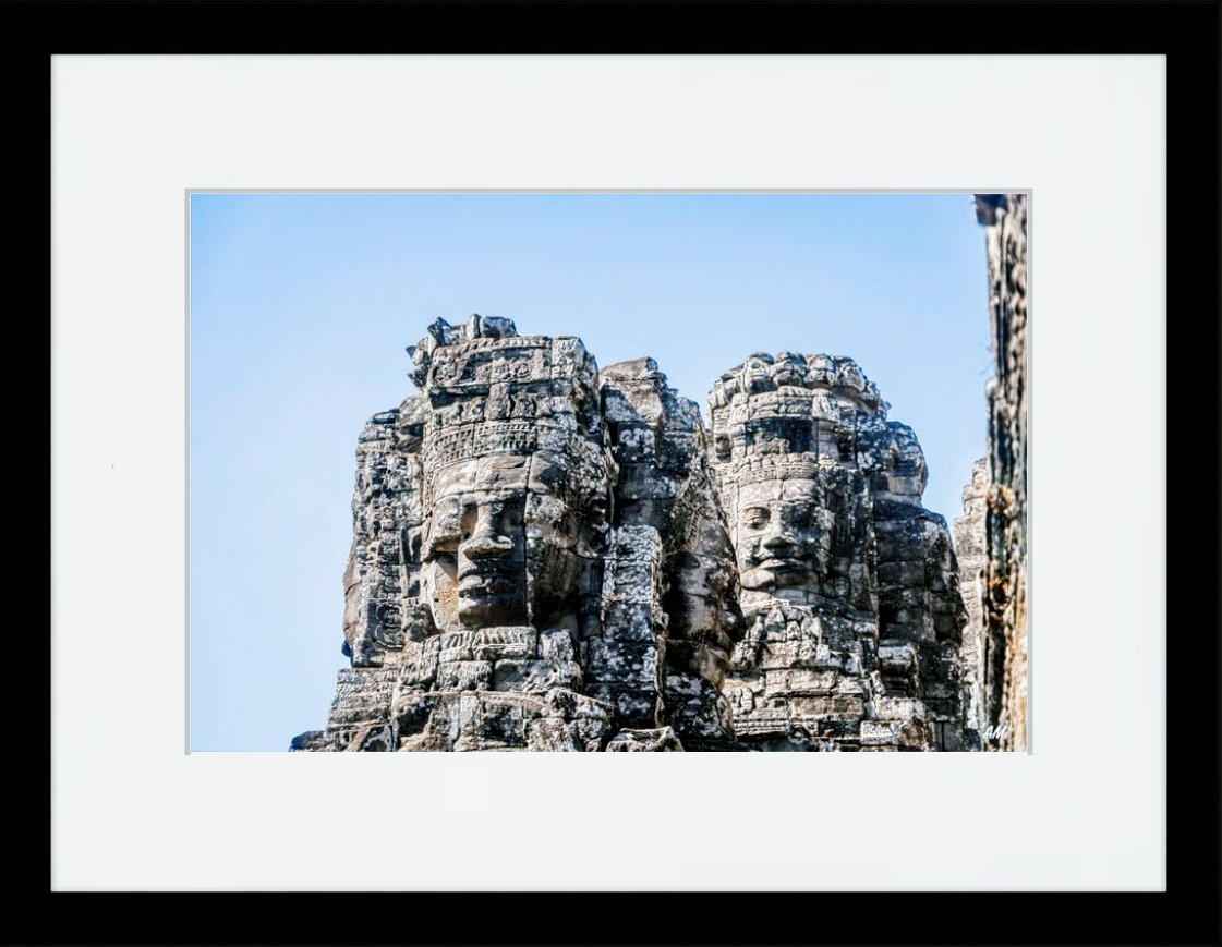 Massive smiling stone face at Bayon Temple Angkor Thom late afternoon light - Bayon Temple photography